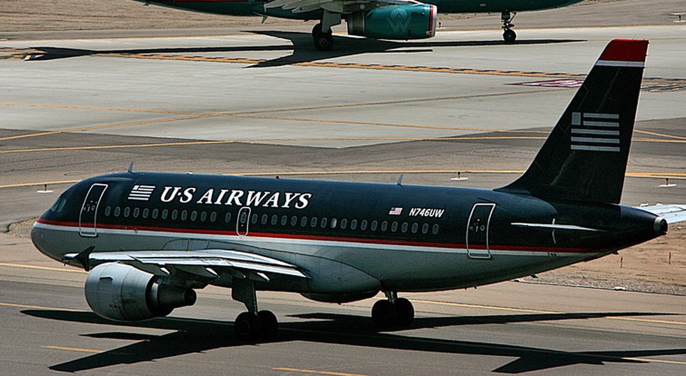 US Airways diz que tenta, há dois anos, ter acesso a sete slots (direitos de pouso e decolagem) no aeroporto de Guarulhos — Foto: Matt York/AP
