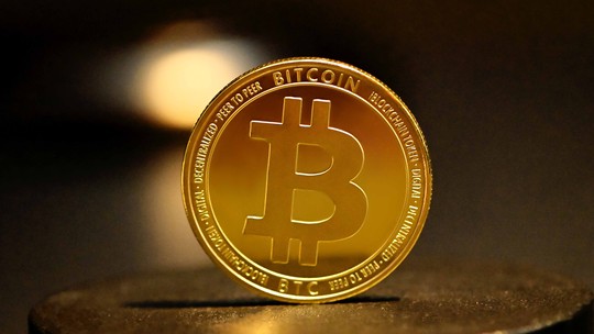 Bitcoin reduz alta e volta a operar nos US$ 26 mil
