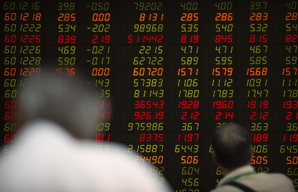 mercado financeiro da China; bolsa — Foto: Mark Schiefelbein / Associated Press