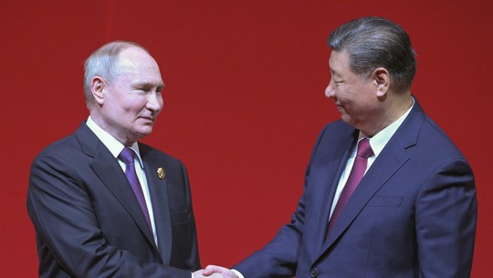 Foto sorridente com Xi é importante para Putin, mas o preço para a Rússia é alto 